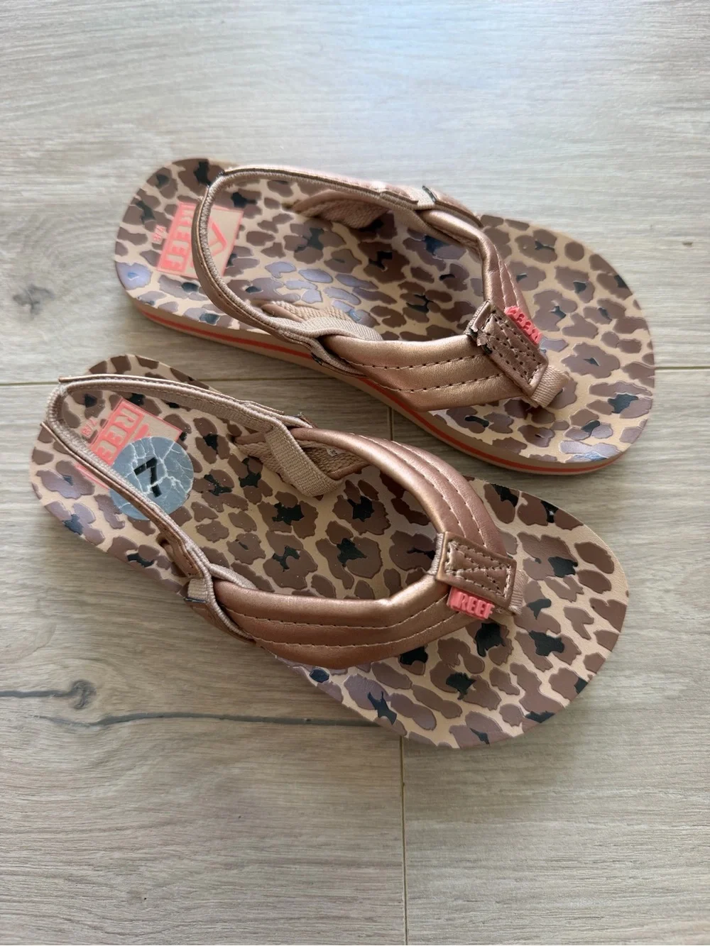 Reef Brown Leopard Print Flip Flops with Metallic Bronze Straps